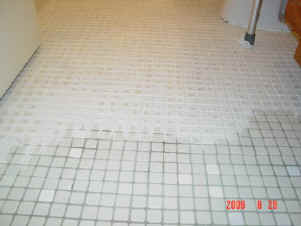 bathroom floor during grout coloring